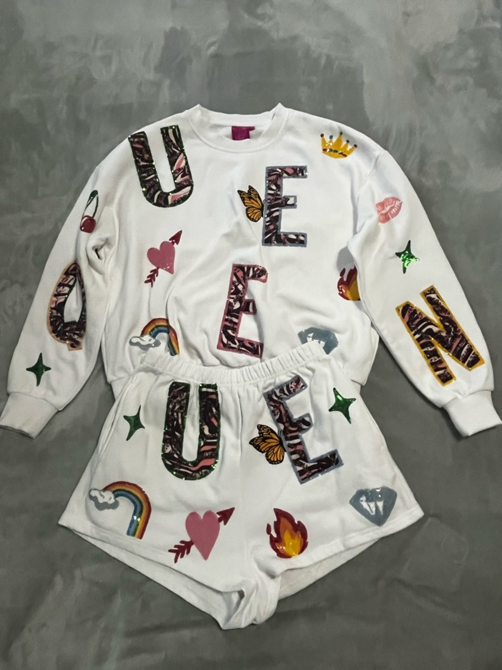 QUEEN OF SPARKLES White Patch Motif Sweatshirt & Shorts Set